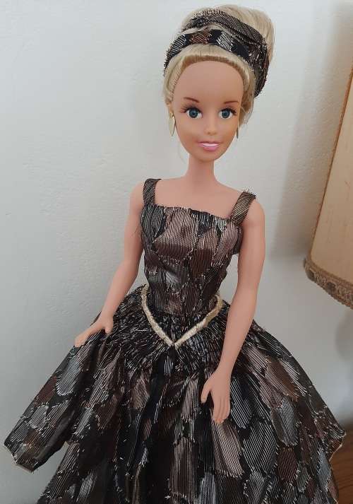 Shiny black patch flounced dress on 47cm doll