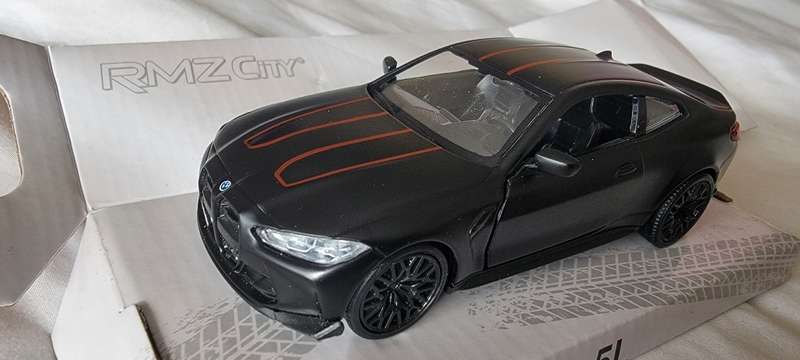Black BMW M4 Limited Edition Die-Cast Metal Model Car, with functioning opening doors!
