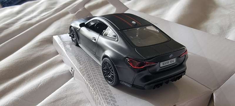 Black BMW M4 Limited Edition Die-Cast Metal Model Car, with functioning opening doors!
