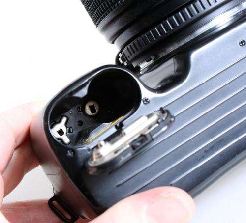 Nikon N70 Film Camera with 70-210mm f4~5.6 Lens//Student Photography. Battery cover is sellotaped