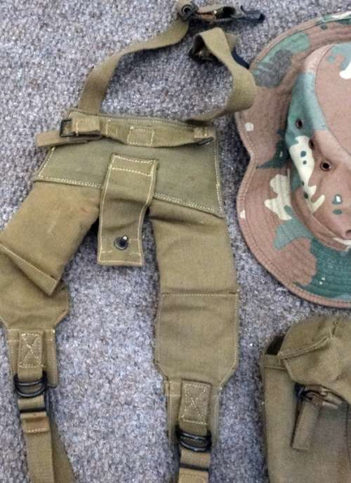Variety of Webbing Bottle and Magazine Auction