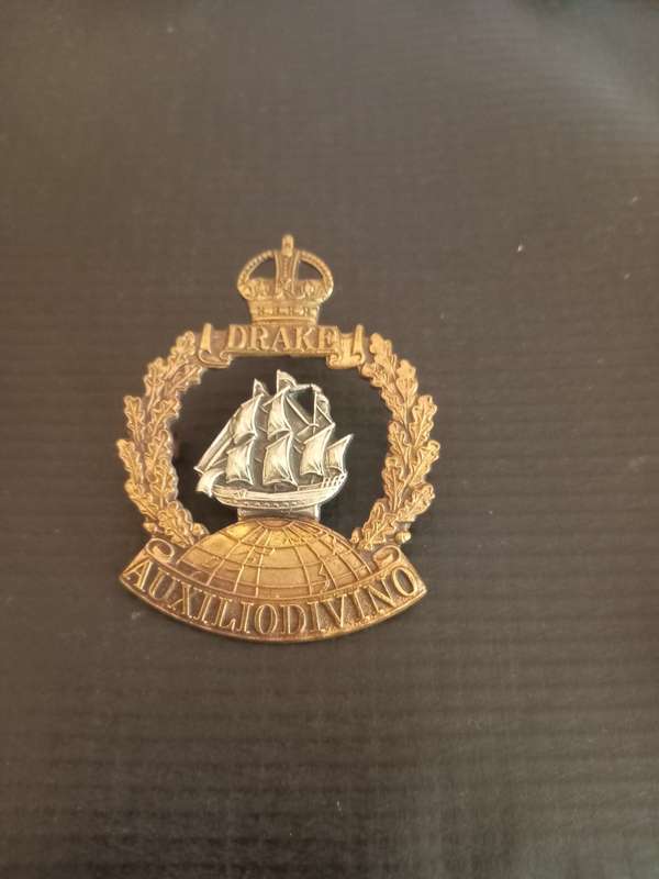Royal Naval Drake battalion cap badge. See description