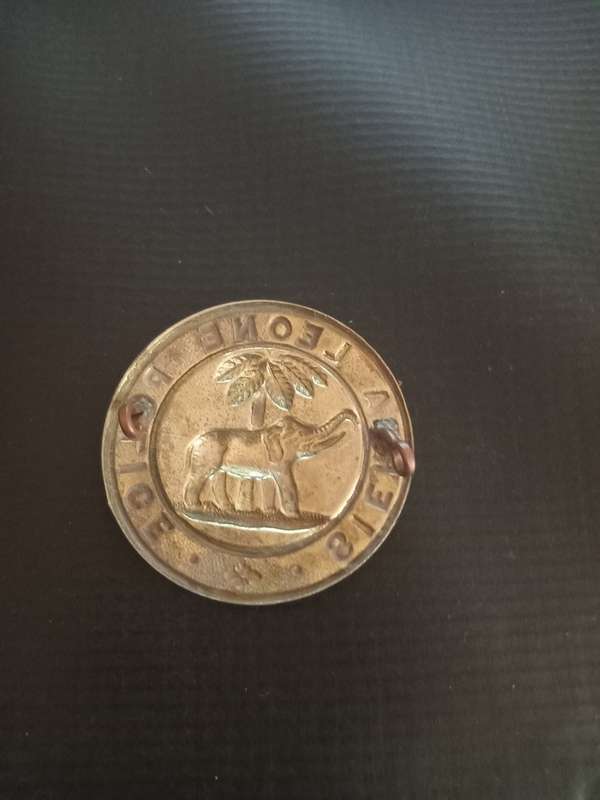 Sierra Leone Police cap badge. See description