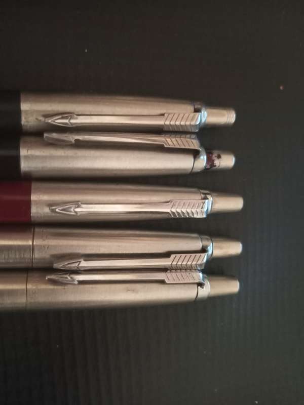 4 Parker Ballpoint pens and 1 Parker Clutch Pencil