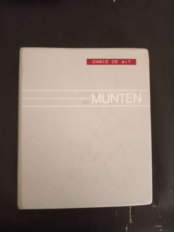 14 Page album filled with over 100 World  coins
