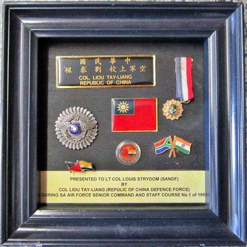 ## Col. Liou Tay-Liang Republic of China Miniature Medal & Badges Presented to Lt. Col. Strydom ##