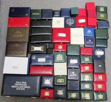 ## 60 SA Mint and World coin Boxes. ## Kruger Rand boxes. NO COINS