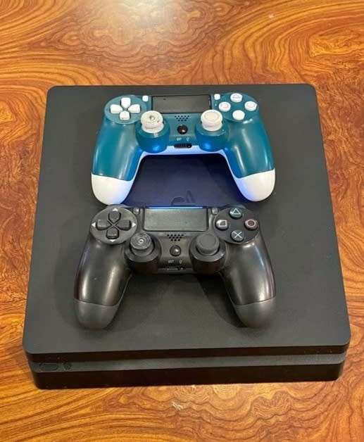 Playstation 4 slim with 2 remotes