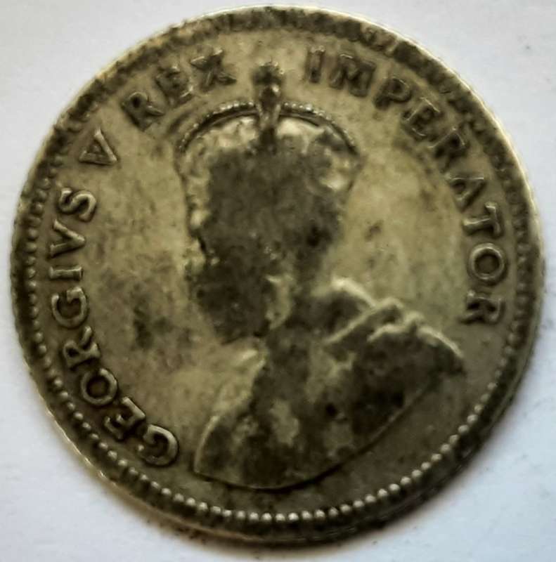 1928 2 ½ Shillings + 1923 6 Pence