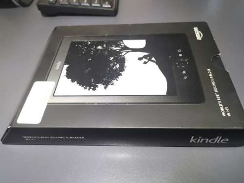 Kindle WiFi e ink. With a free Speck cover.
