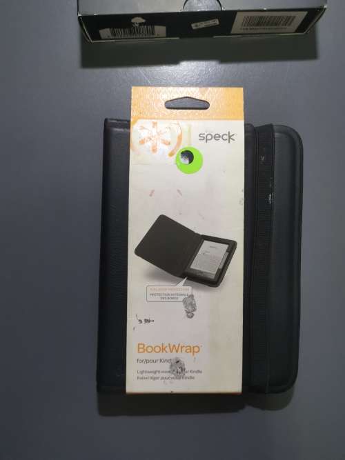 Kindle WiFi e ink. With a free Speck cover.