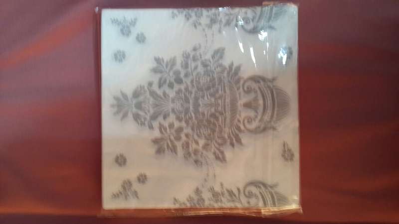 Grey fancy print serviettes