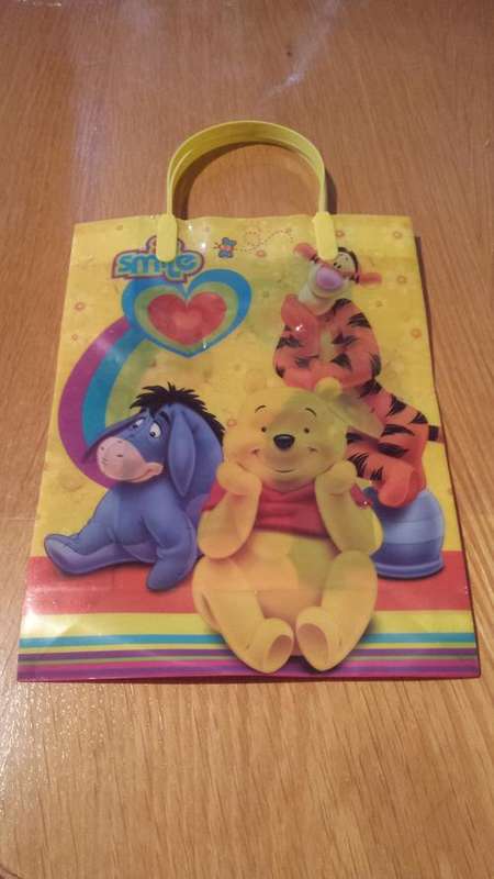 Winnie the pooh party gift bag/ goodies bag- 18cm by 24cm- Plastic