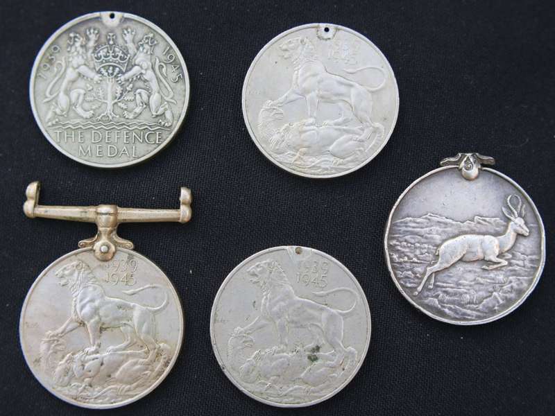 Lot of five WWII medals mostly without suspenders VF