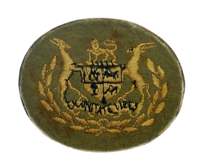 Sergeant Major Class I embroidered badge mounted on metal backing