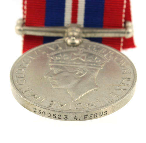 War Medal 1939 - 1945 awarded to a South African named WWII VF