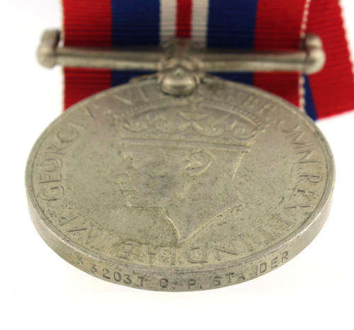 War Medal 1939 - 1945 awarded to a South African named WWII VF