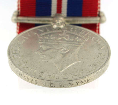 War Medal 1939 - 1945 awarded to a South African named WWII