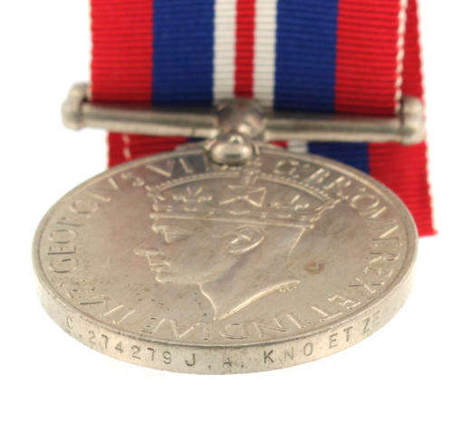 War Medal 1939 - 1945 awarded to a South African named WWII