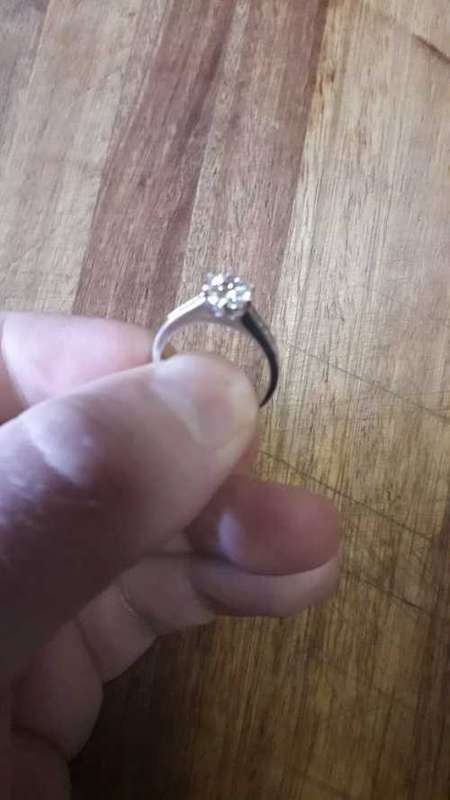18ct White Gold Solitaire with Channel: Total Diamond weight 1.12ct with 1ct Center stone