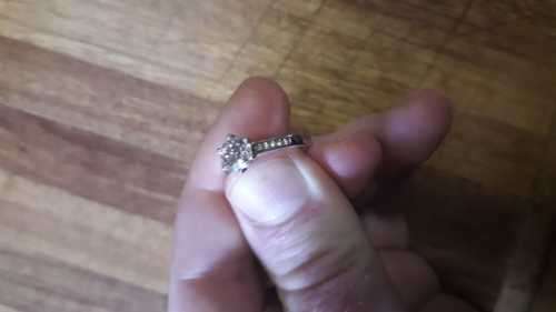 18ct White Gold Solitaire with Channel: Total Diamond weight 1.12ct with 1ct Center stone