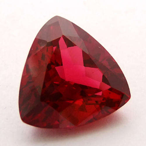 13.35. **GLISTENING RED TRILLIANT CUT TOPAZ GEMSTONE