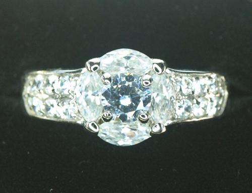 SPECTACULAR SIMULATED WHITE DIAMOND ENGAGEMENT RING
