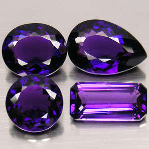 Set of 4 gems! 43.76 ct DARK PURPLE  COLOUR CHANGING AMETHYST GEMSTONES