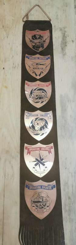 Rare Rhodesia hanging leather strap with 6 military operation copper plaques