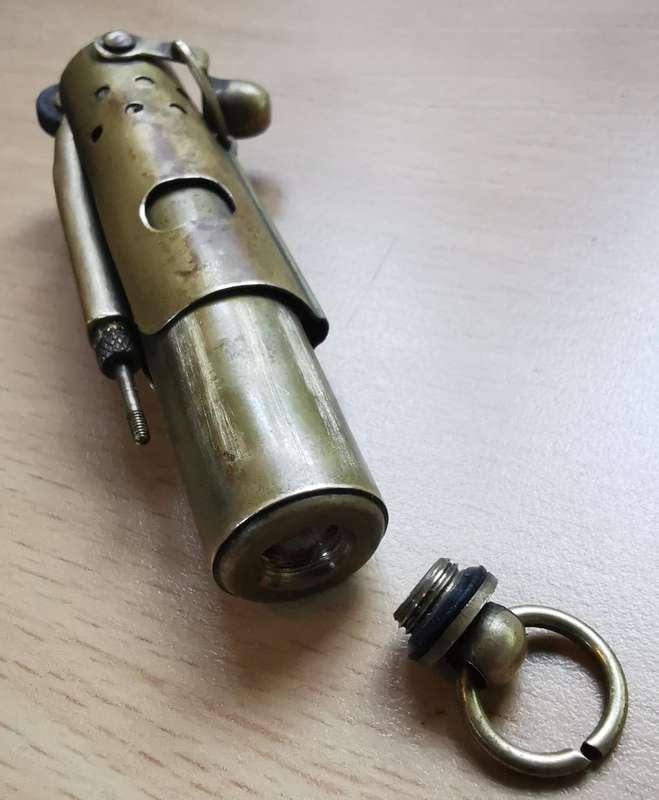 Brass trench lighter with 2 pouches