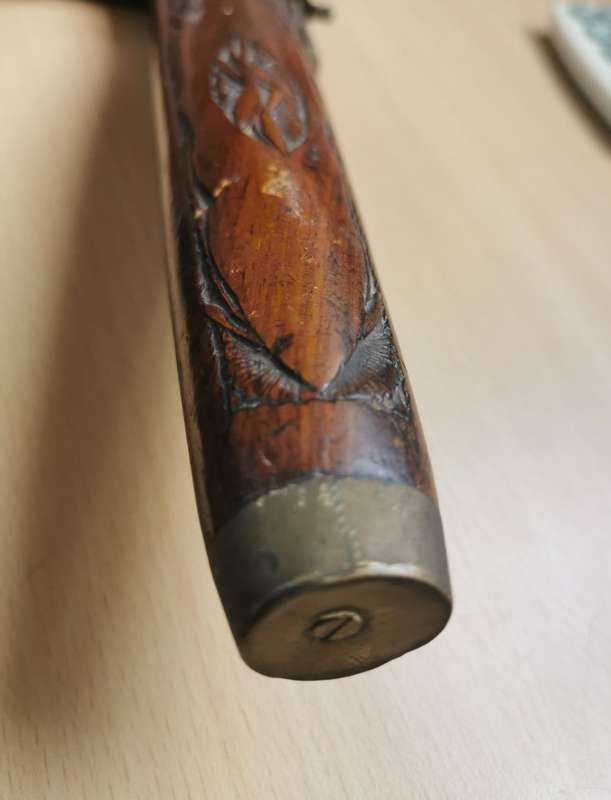 Pistol-grip hand-carved rosewood and brass knife, made in India