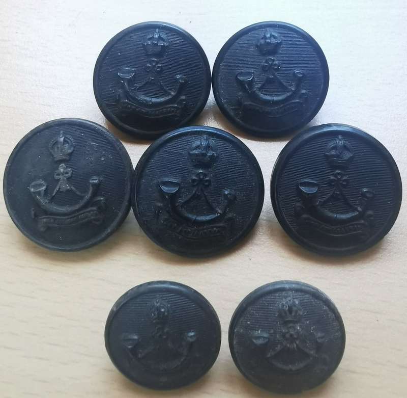 Lot of 7 King`s African Rifles composite buttons
