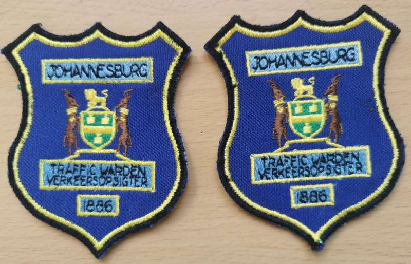 Vintage pair of Johannesburg Traffic Warden Verkeersopsigter badges