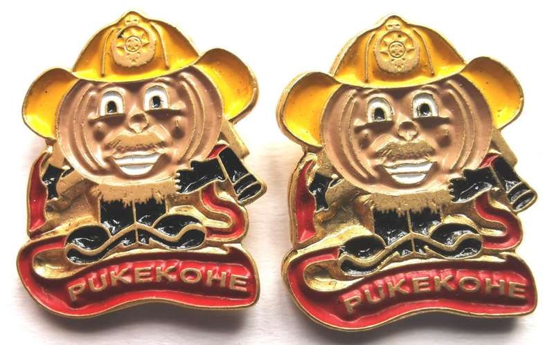 Vintage pair of New Zealand Pukekohe fire brigade lapel pin badges