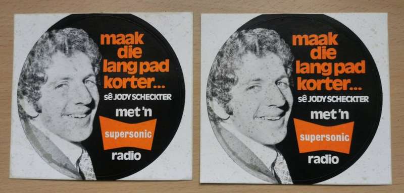 Pair of rare 1974 Afrikaans Jody Scheckter car license disk stickers advertising Supersonic Radios