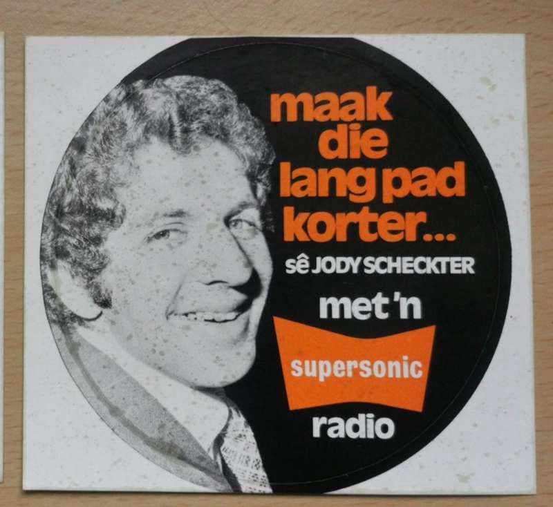 Pair of rare 1974 Afrikaans Jody Scheckter car license disk stickers advertising Supersonic Radios