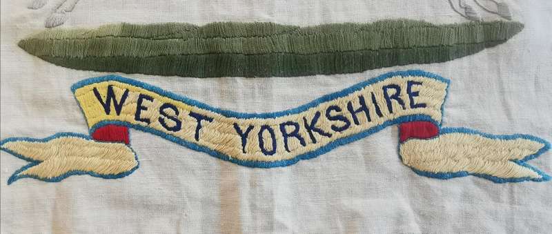 Large WW2-era West Yorkshire Regiment hand-embroidered insignia on cloth