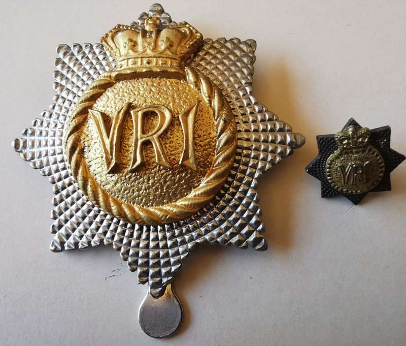 Royal Canadian Regiment bi-metal cap badge plus small pin badge