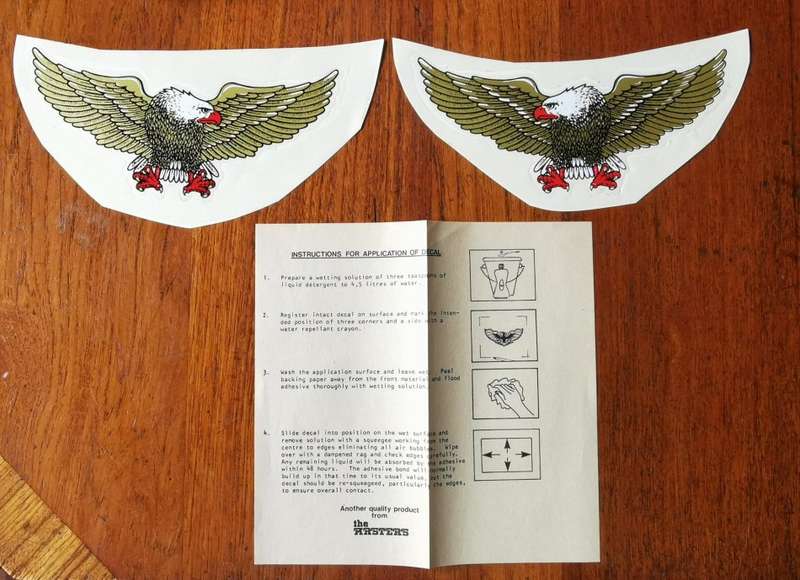Pair of vintage car body or window eagle decal stickers, with instructions