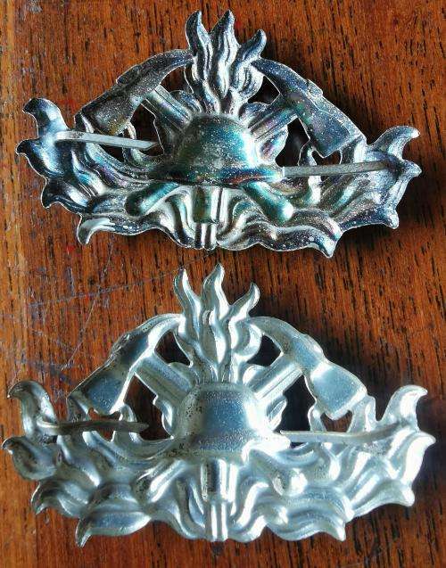 Pair of old West German firefighter feuerwehr hat badges