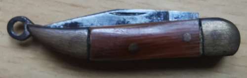 Vintage German-made tiny pocket knife with end ring