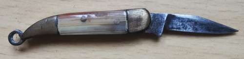 Vintage German-made tiny pocket knife with end ring