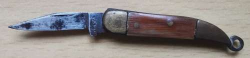 Vintage German-made tiny pocket knife with end ring