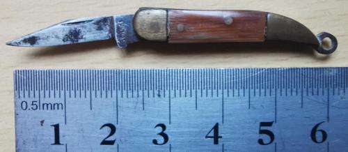 Vintage German-made tiny pocket knife with end ring