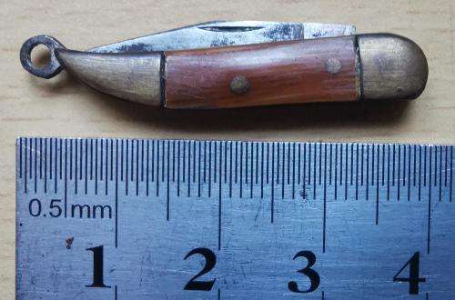 Vintage German-made tiny pocket knife with end ring