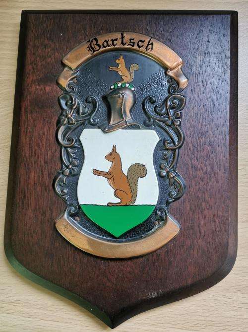 Vintage copper Bartsch family crest on wooden plaque