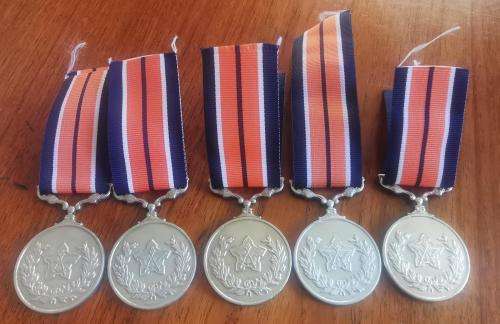 Full-size General Service medal with ribbon - numbered on back