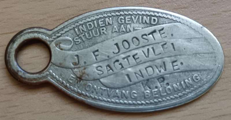 WW2-era key reward token converted to sweetheart tag