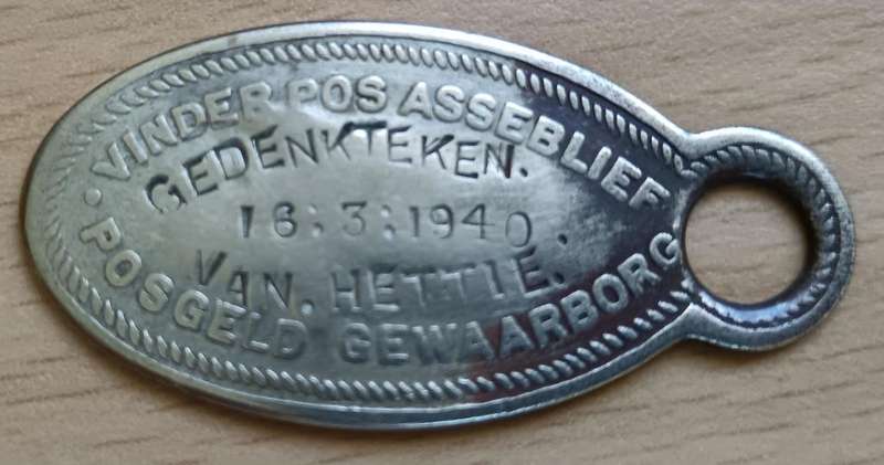 WW2-era key reward token converted to sweetheart tag