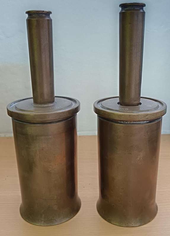 Pair of brass MK4 Bofors 40mm naval gun shells and 0,50 BMG cartridges made into bells